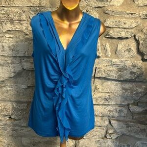 Top with ruffles and ruching